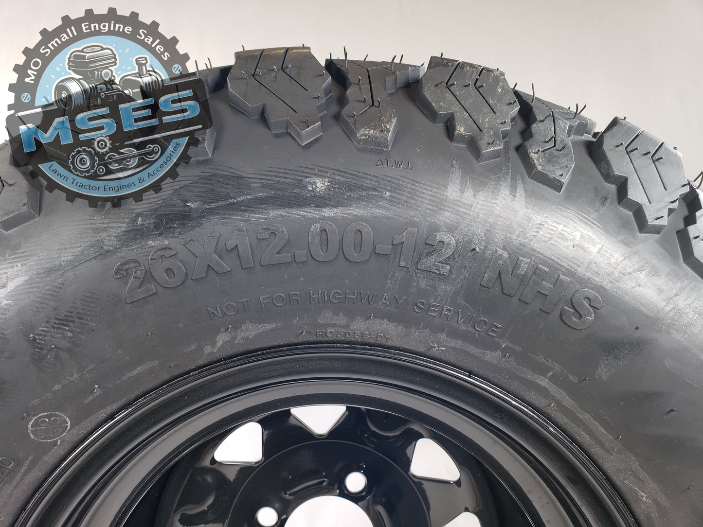 26" x 12.00" - 12 NHS VOODOO TRAC drive tire