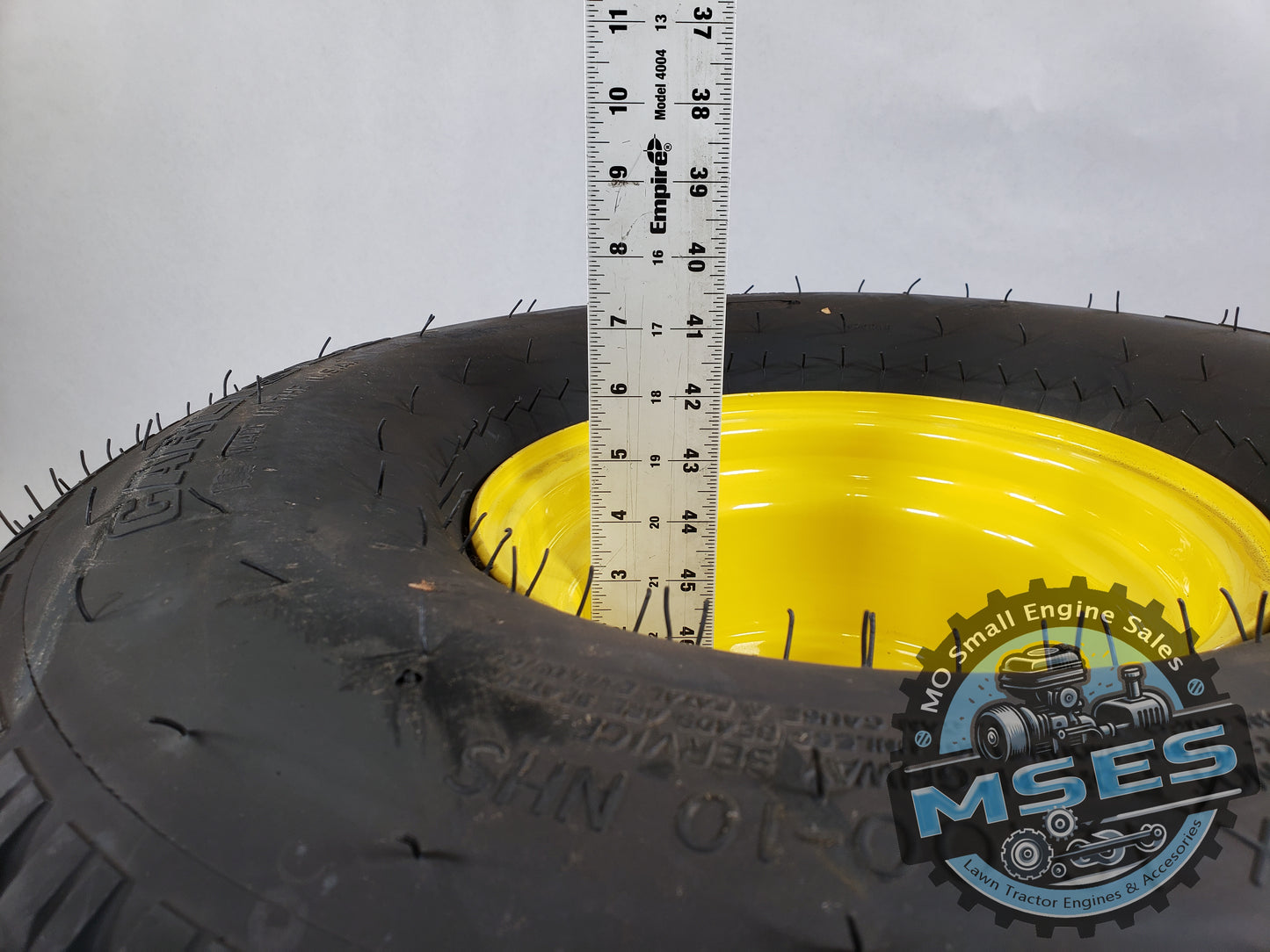 Carlisle 37170 24 x 12.00 - 10 NHS Turf Trac R/S Tread Pneumatic Wheel Assembly