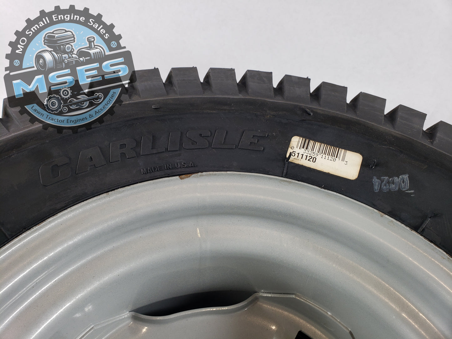 Carlisle 15763 23 x 10.50 - 12 NHS Turf Saver Tread Pneumatic Wheel Assembly